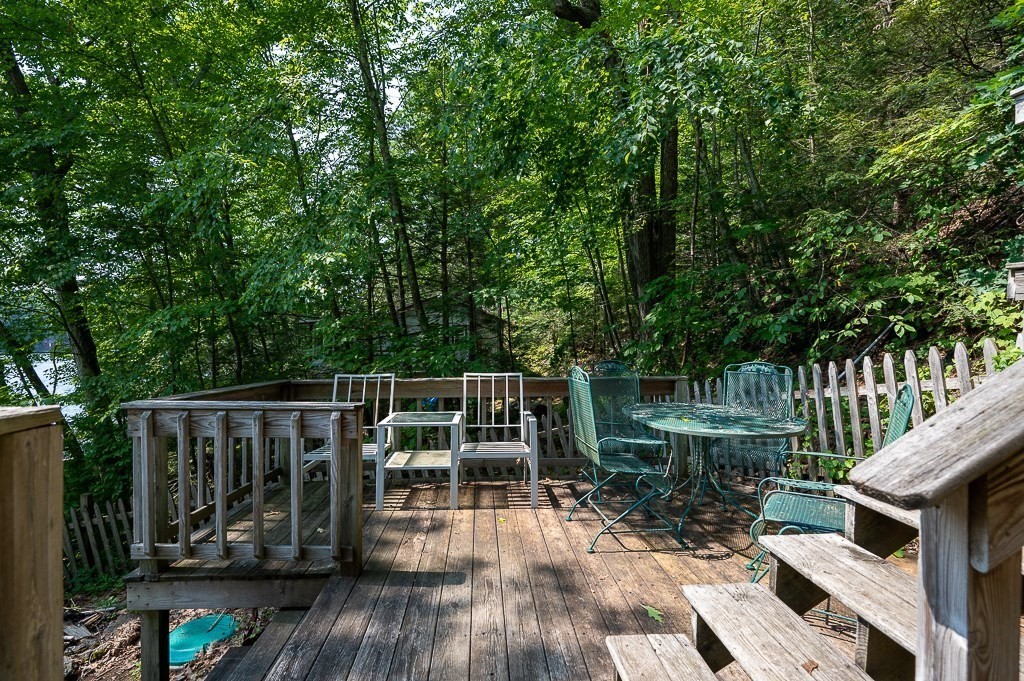 42 Goodrich Road Sturbridge, MA 01566 - Photo 24 of 36 a view of balcony with wooden floor and outdoor seating