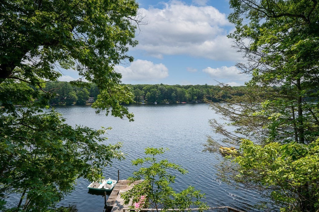 42 Goodrich Road Sturbridge, MA 01566 - Photo 26 of 36 a view of a lake with a garden