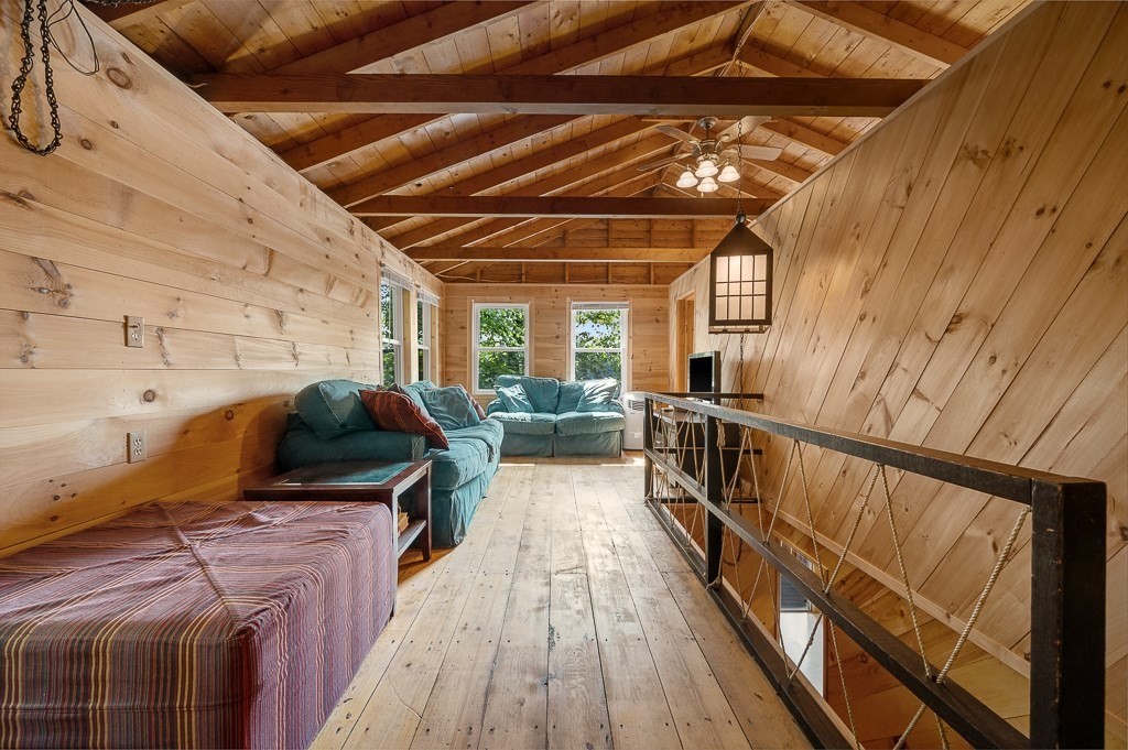 42 Goodrich Road Sturbridge, MA 01566 - Photo 4 of 36 a view of a balcony with chairs
