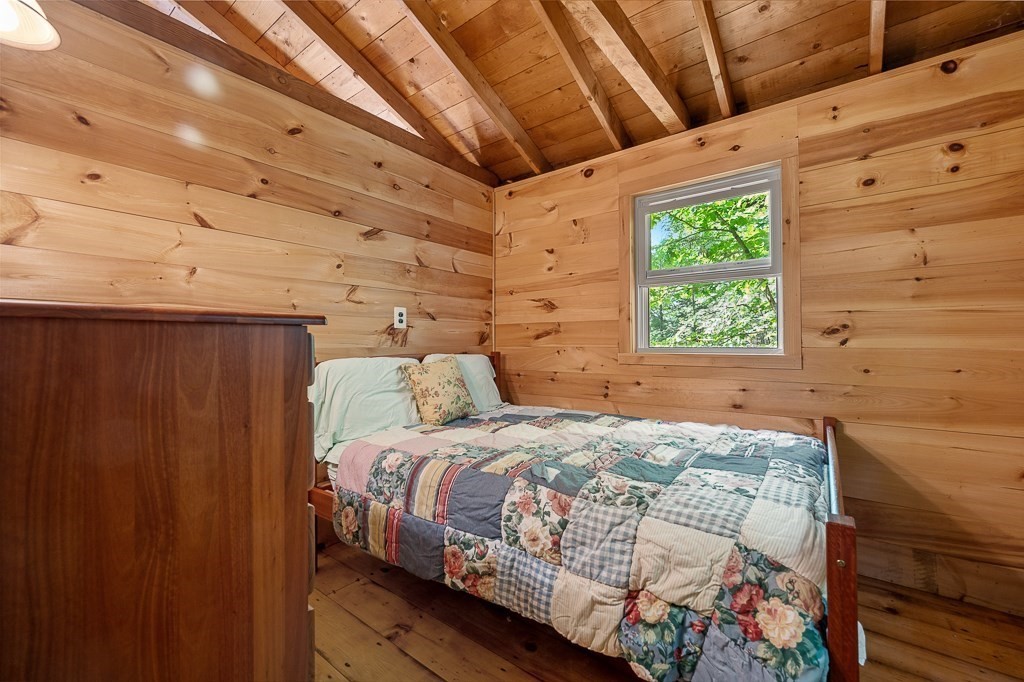 42 Goodrich Road Sturbridge, MA 01566 - Photo 9 of 36 a bedroom with a bed and a window