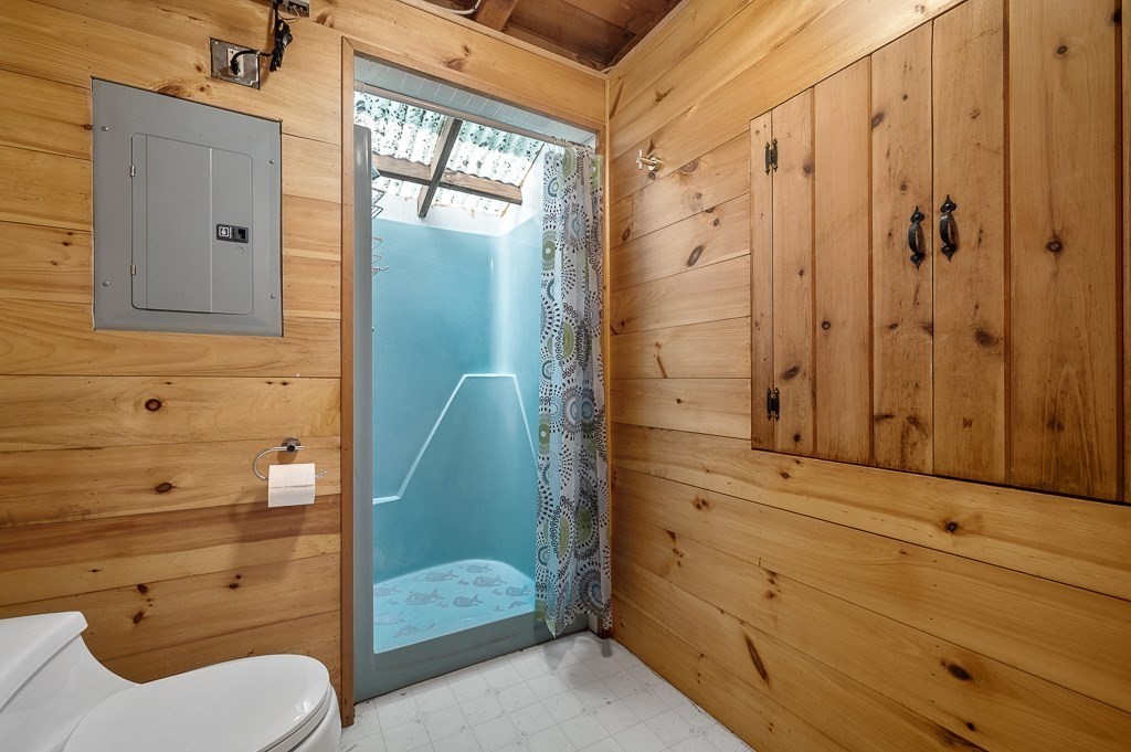 42 Goodrich Road Sturbridge, MA 01566 - Photo 10 of 36 a bathroom with a sink a toilet and shower
