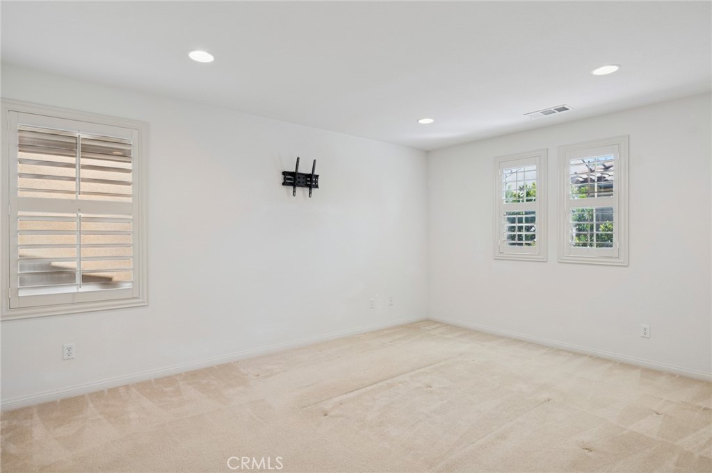93 Keepsake Irvine, CA 92618 - Photo 14 of 25 an empty room with windows