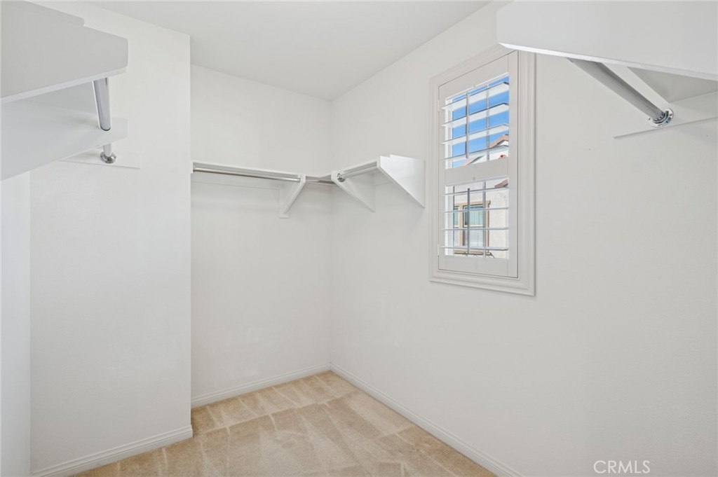 93 Keepsake Irvine, CA 92618 - Photo 17 of 25 a view of a room with rack on the wall