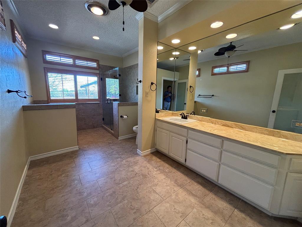 4702 Ranch View Road Fort Worth, TX 76109 - Photo 21 of 40 Expansive vanity with integrated sink and large mirror