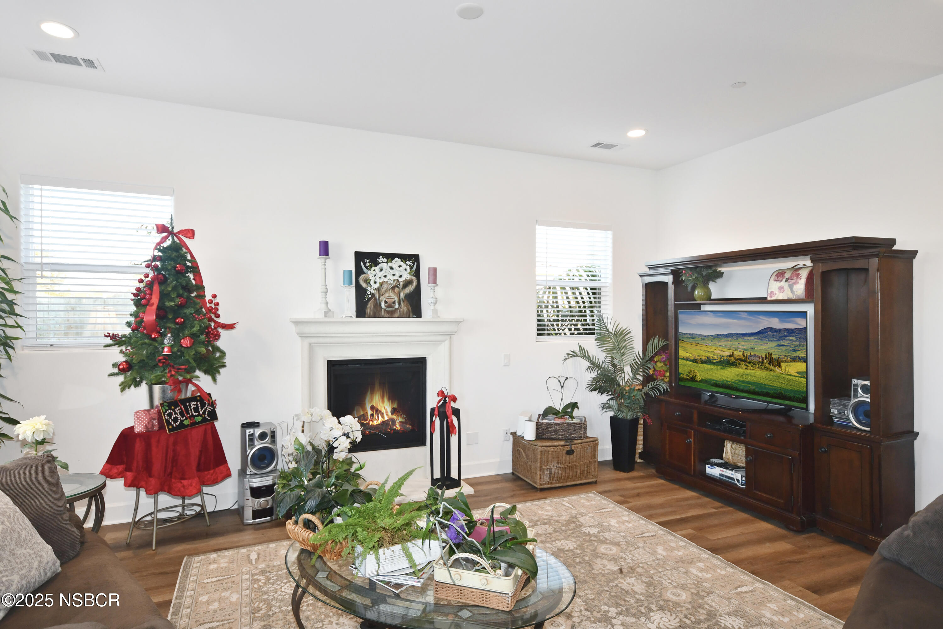 813 Skyview Lane Santa Maria, CA 93455 - Photo 13 of 49 a living room with furniture and a flat screen tv