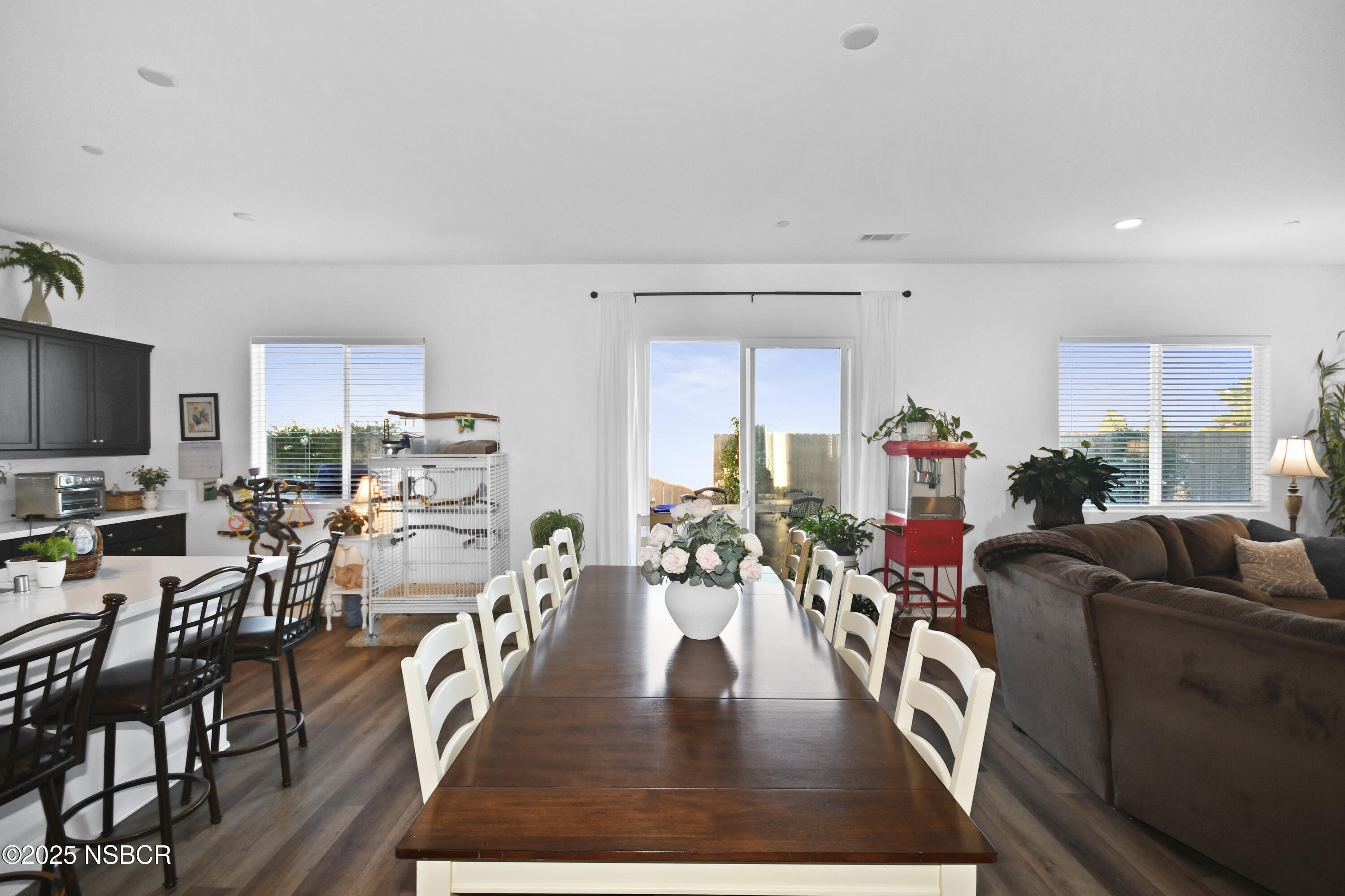 813 Skyview Lane Santa Maria, CA 93455 - Photo 14 of 49 a living room with furniture dining table and a flat screen tv