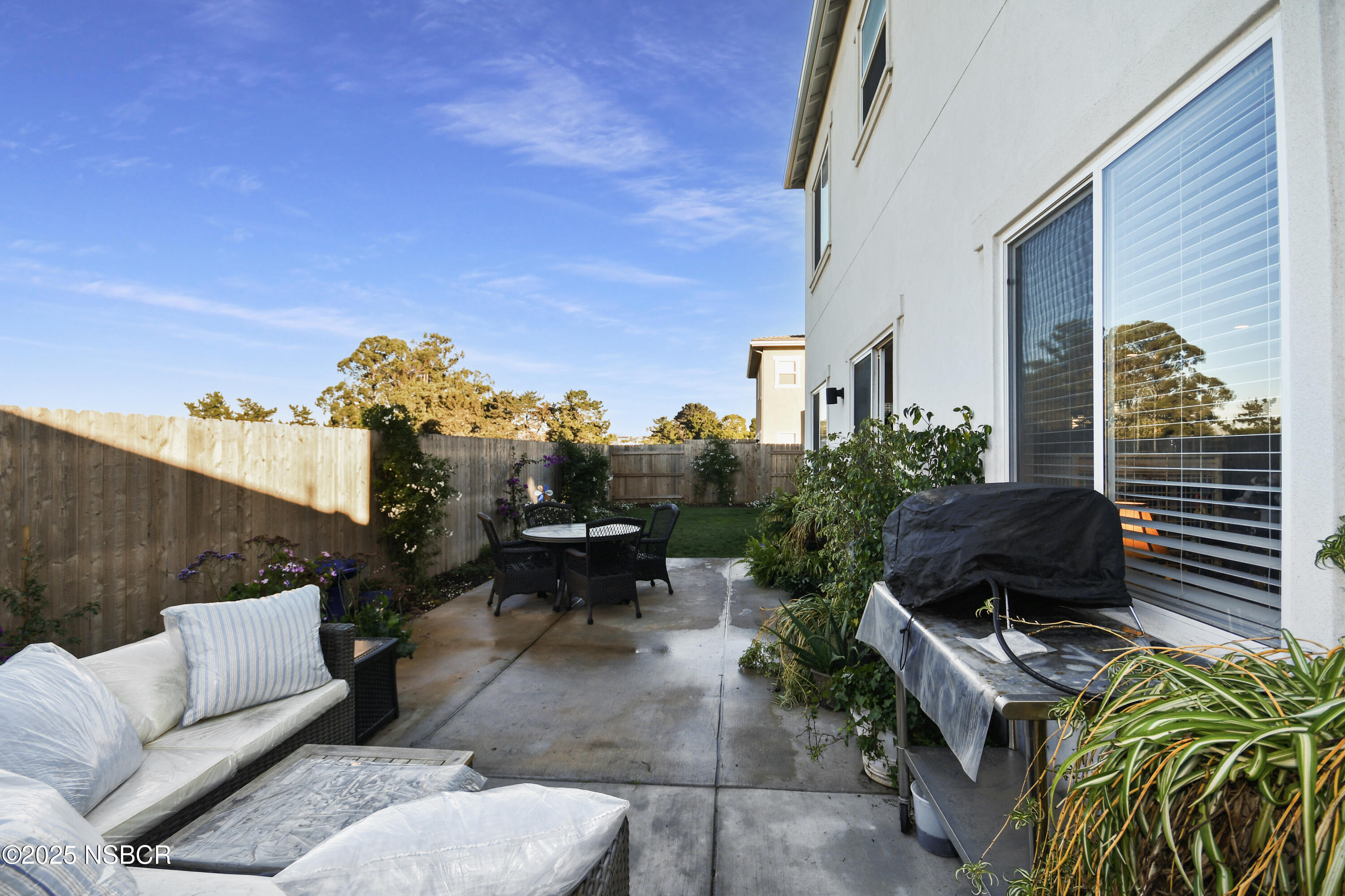 813 Skyview Lane Santa Maria, CA 93455 - Photo 35 of 49 a backyard of a house with outdoor seating