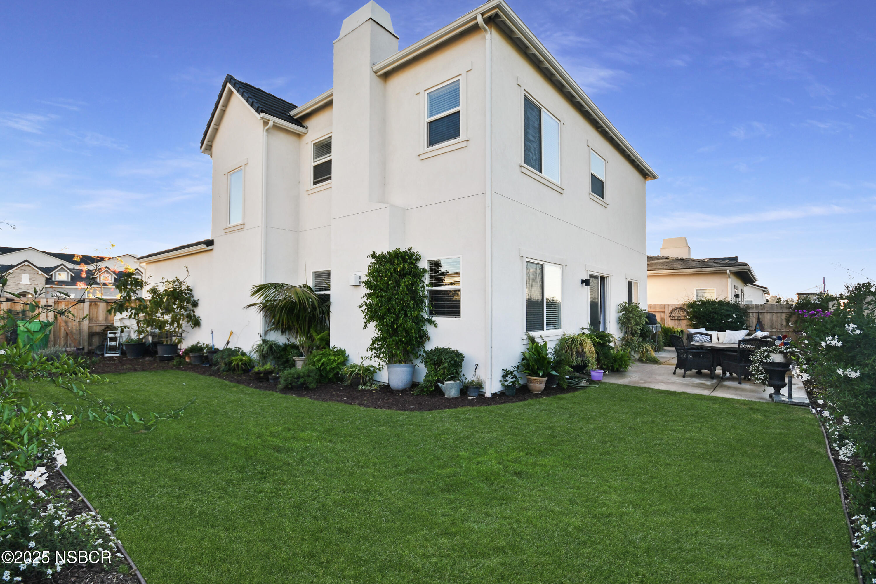 813 Skyview Lane Santa Maria, CA 93455 - Photo 37 of 49 a front view of a house with a yard and seating space