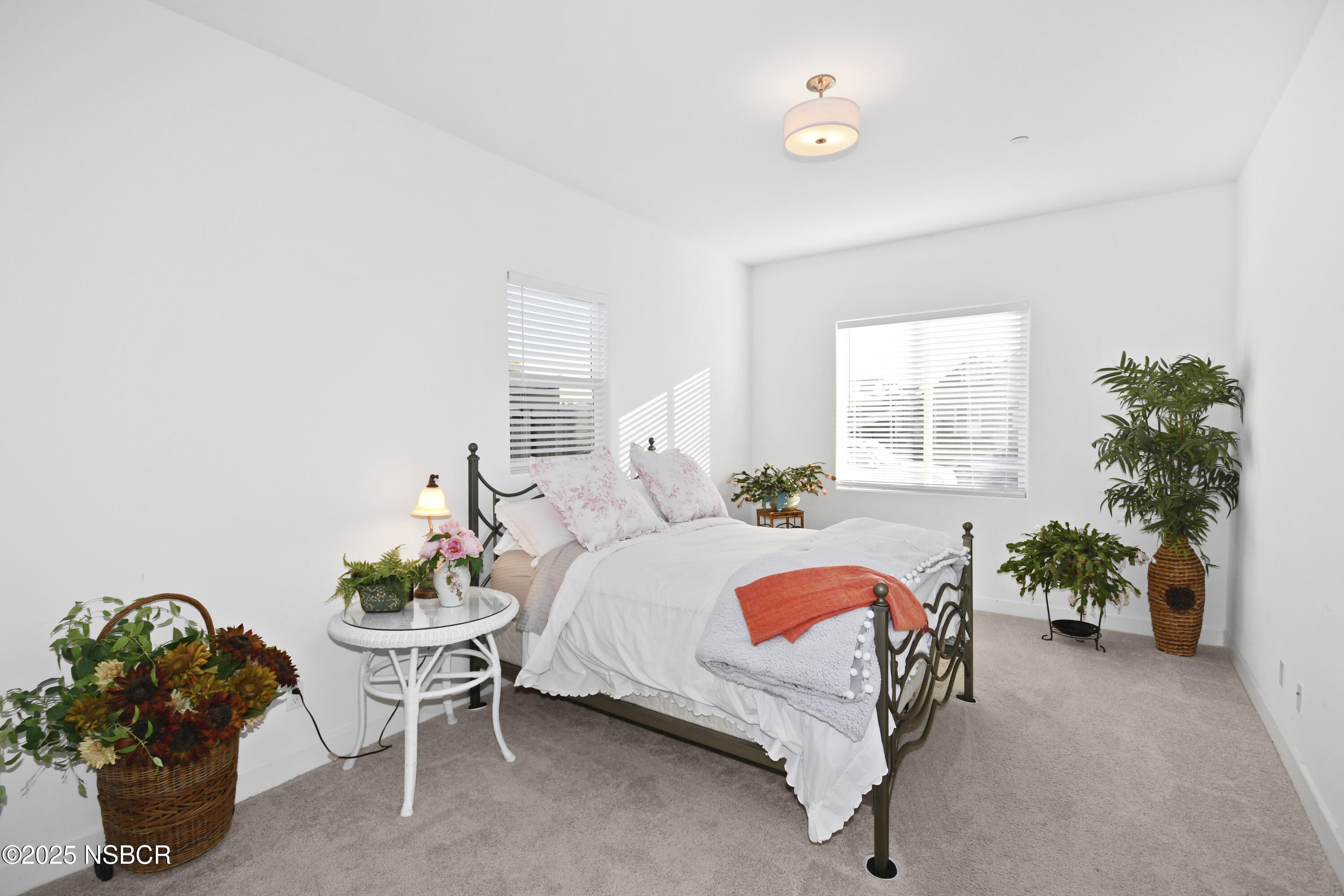 813 Skyview Lane Santa Maria, CA 93455 - Photo 8 of 49 a bedroom with a bed potted plant and a window