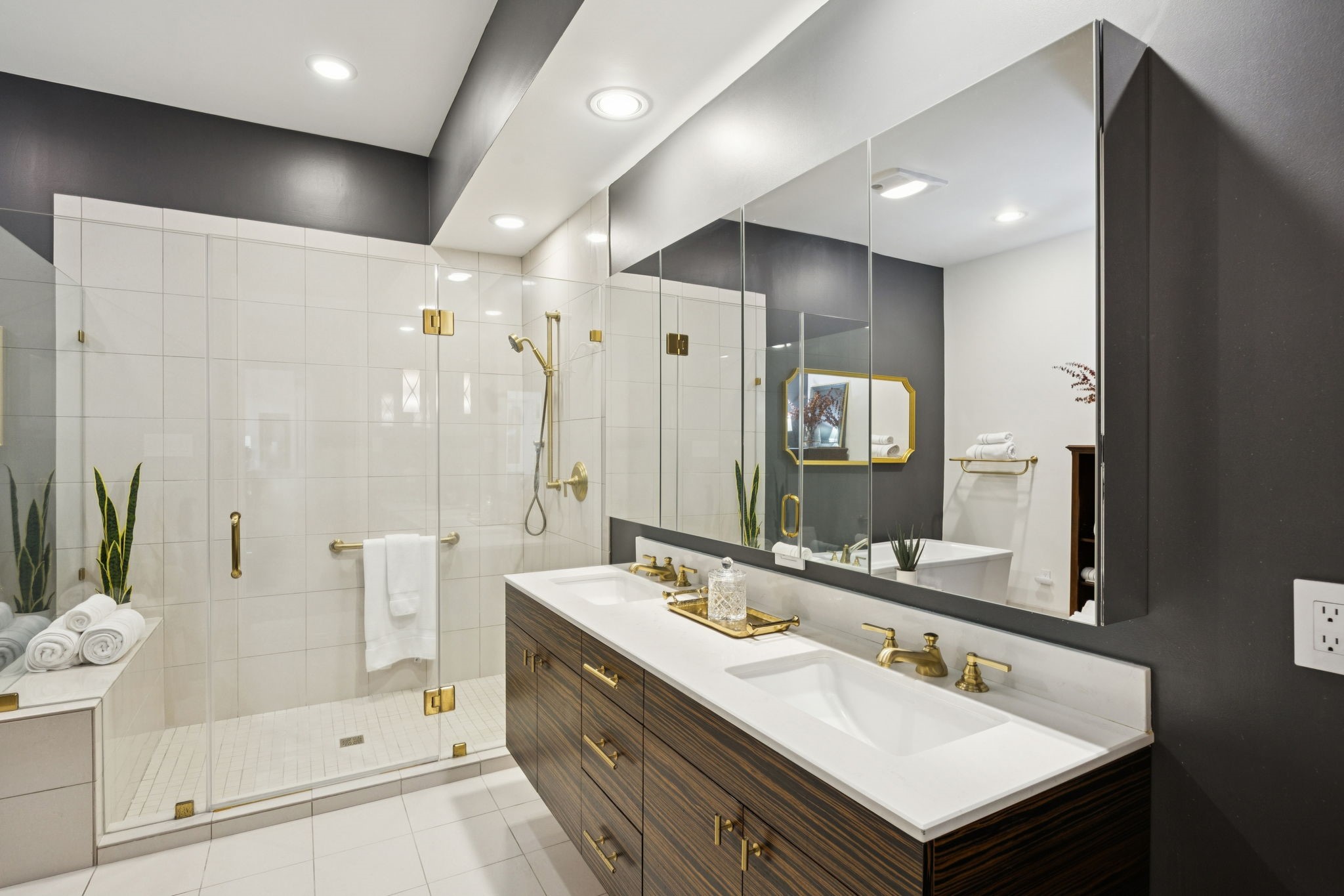 4964 Post Oak Timber Drive Houston, TX 77056 - Photo 26 of 48 Custom macassar ebony floating vanity with Newport brass fixtures, large enclosed glass shower, and rich peppercorn walls.