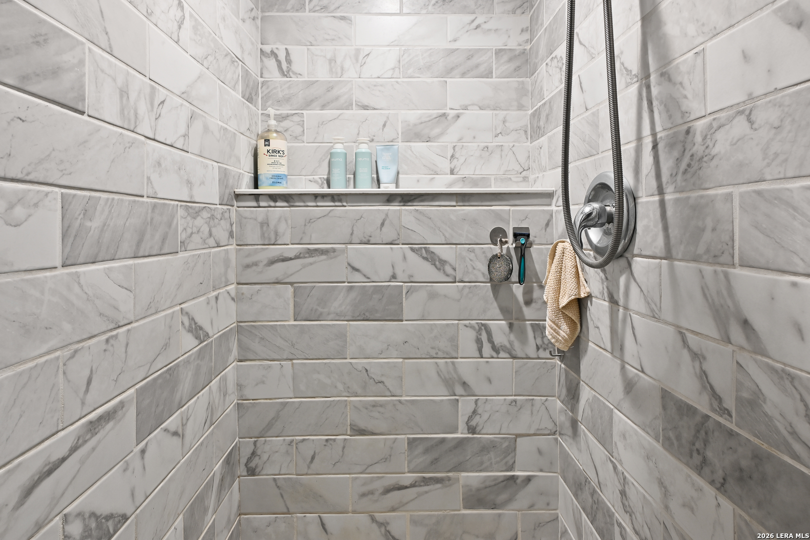 713 Lake Forest Road Pipe Creek, TX 78063 - Photo 20 of 65 a bathroom with a shower