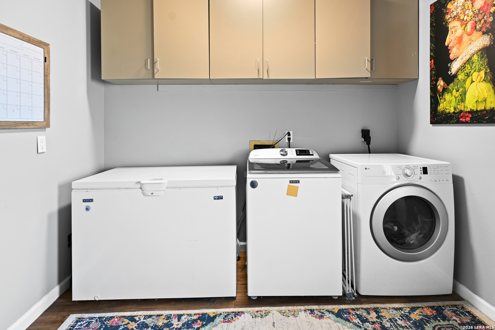 713 Lake Forest Road Pipe Creek, TX 78063 - Photo 28 of 65 a utility room with dryer and washer