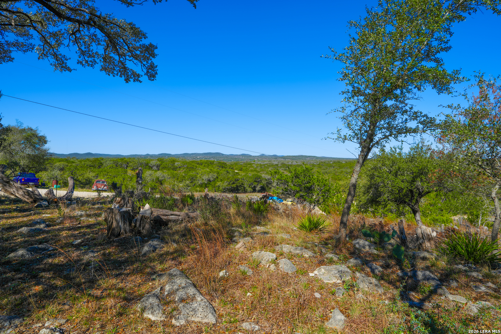 713 Lake Forest Road Pipe Creek, TX 78063 - Photo 38 of 65 a view of a lake with outdoor space