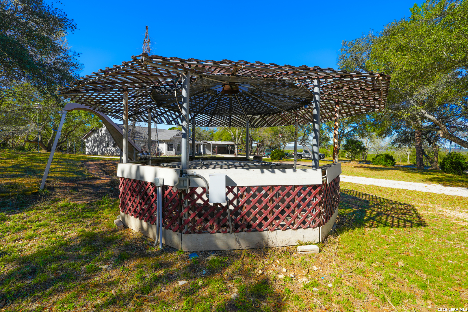 713 Lake Forest Road Pipe Creek, TX 78063 - Photo 40 of 65 a view of swimming pool with a patio