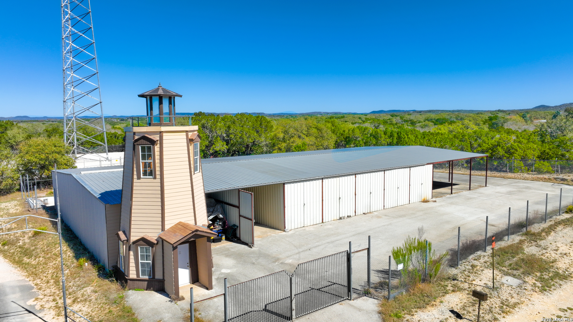 713 Lake Forest Road Pipe Creek, TX 78063 - Photo 47 of 65 a front view of a house with a yard