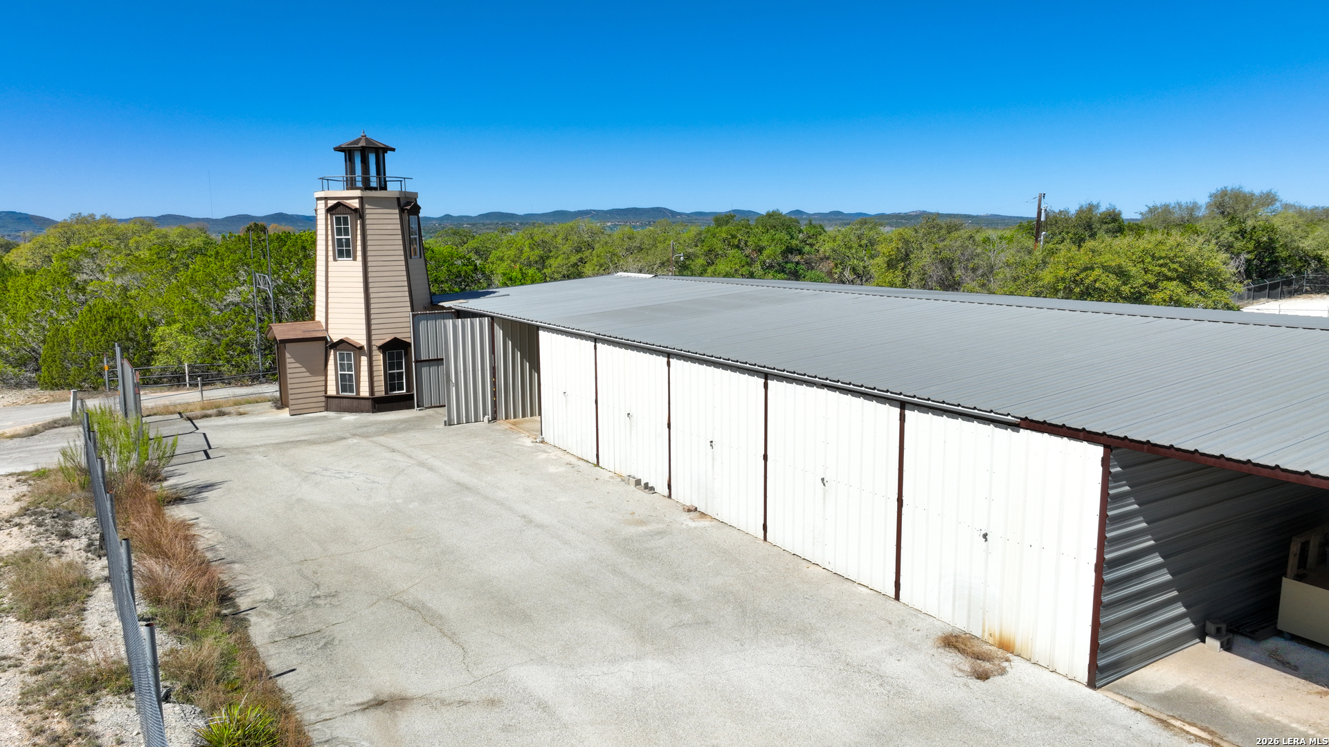 713 Lake Forest Road Pipe Creek, TX 78063 - Photo 52 of 65 a view of a city street from a balcony