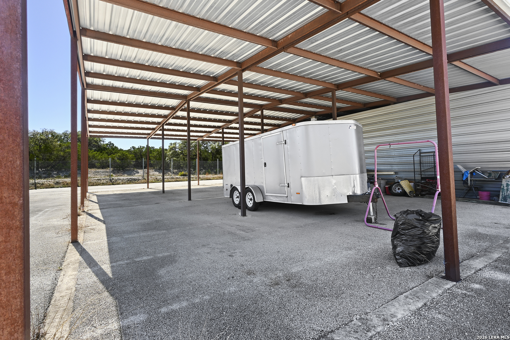 713 Lake Forest Road Pipe Creek, TX 78063 - Photo 61 of 65 a view of a backyard
