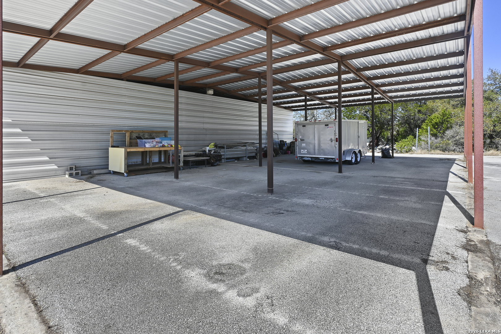 713 Lake Forest Road Pipe Creek, TX 78063 - Photo 62 of 65 a view of a big room with garage