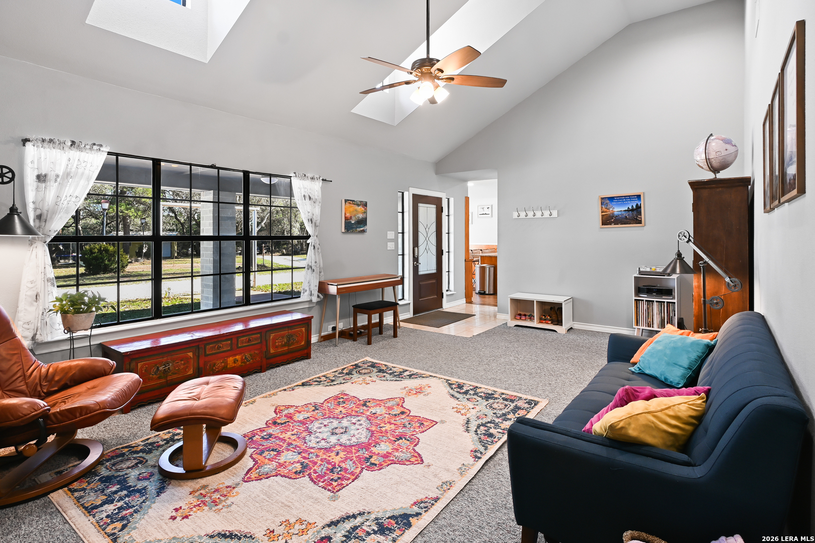 713 Lake Forest Road Pipe Creek, TX 78063 - Photo 9 of 65 a living room with furniture rug and window