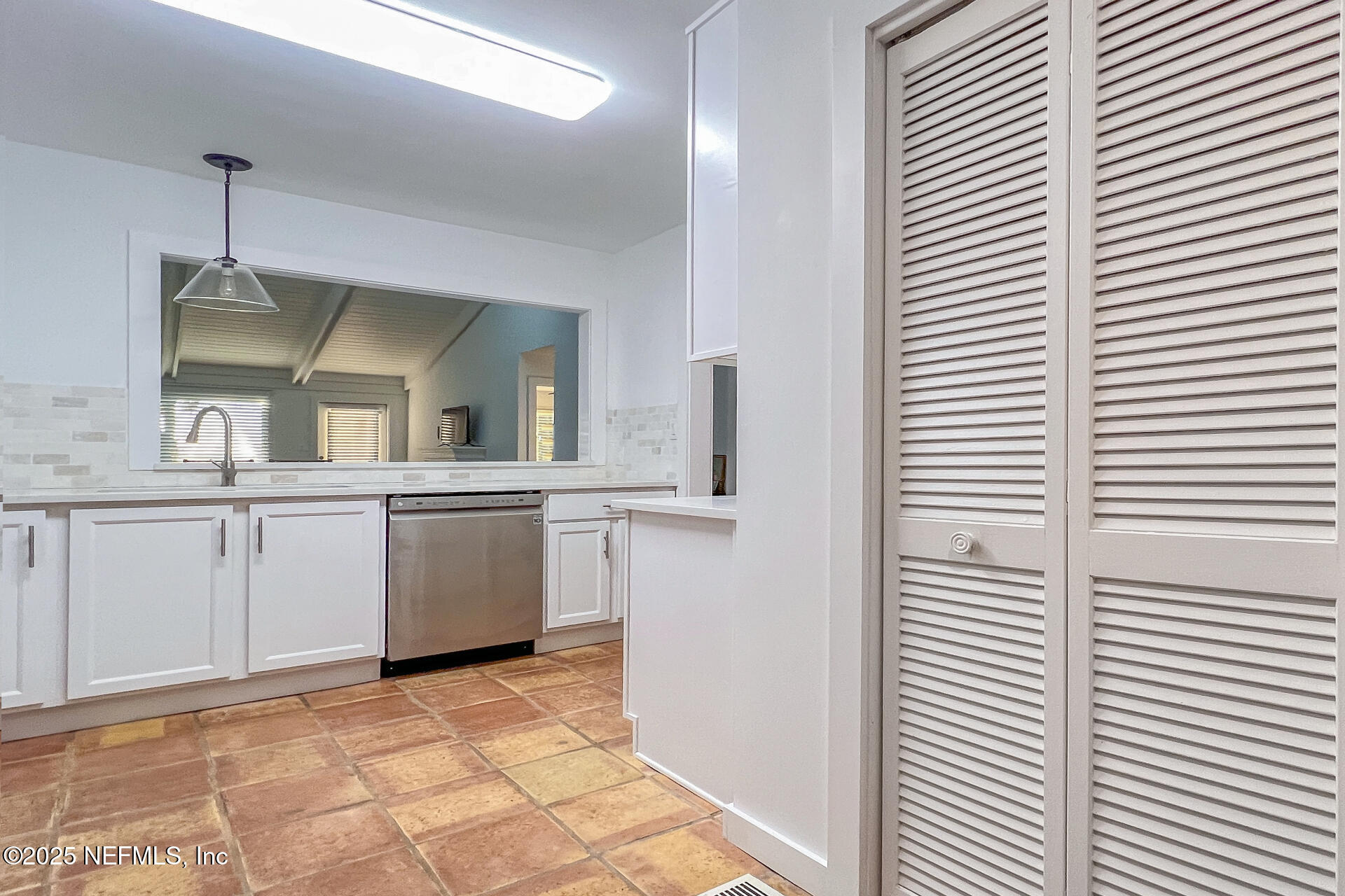 3426 Sea Marsh Road Fernandina Beach, FL 32034 - Photo 16 of 39 a view of a kitchen with a sink