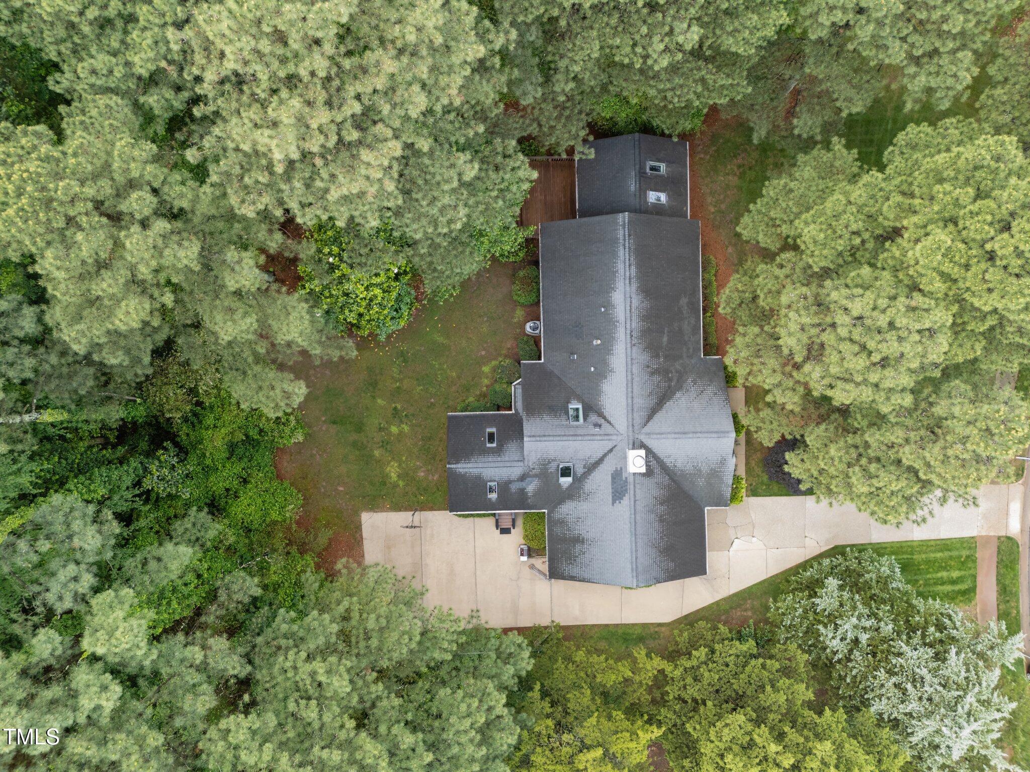 5109 Knaresborough Road Raleigh, NC 27612 - Photo 6 of 35 47-web-or-mls-DJI_20250505160756_0625_D