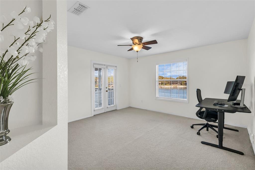 1425 Riviera Drive Kissimmee, FL 34744 - Photo 37 of 82 a view of workspace with a window and a chair