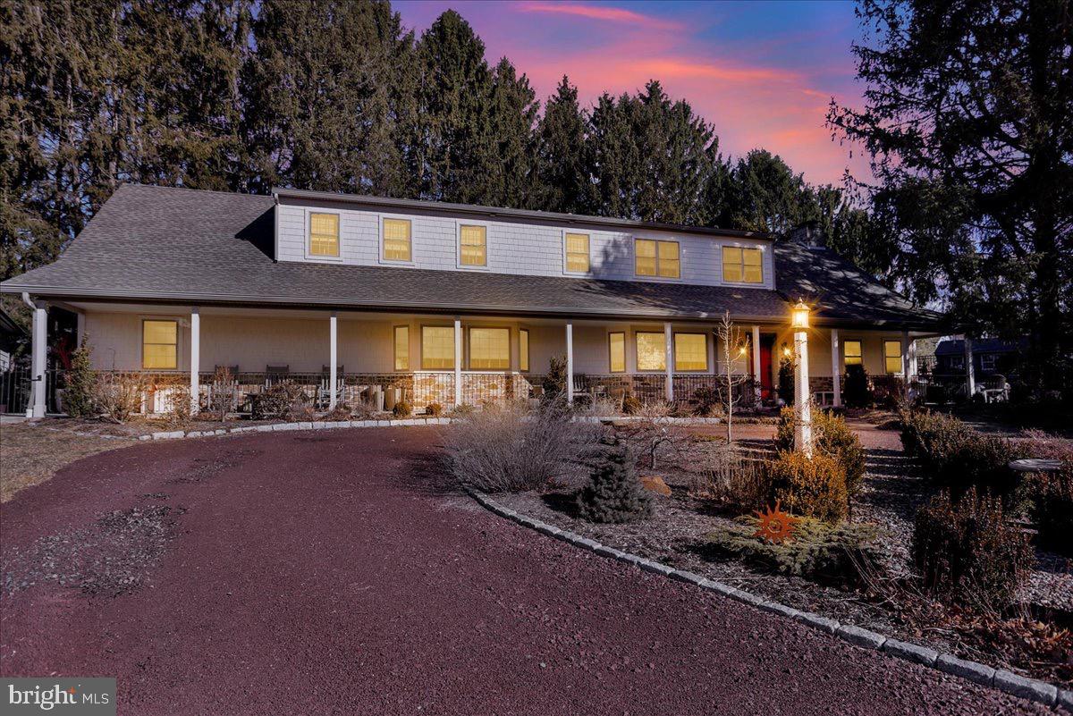 Charming home bathed in twilight hues.