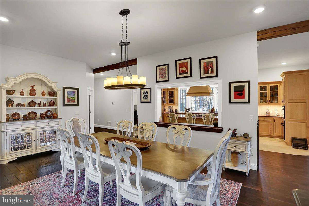 338 Candy Road Mohnton, PA 19540 - Photo 16 of 63 a view of a dining room with furniture and wooden floor
