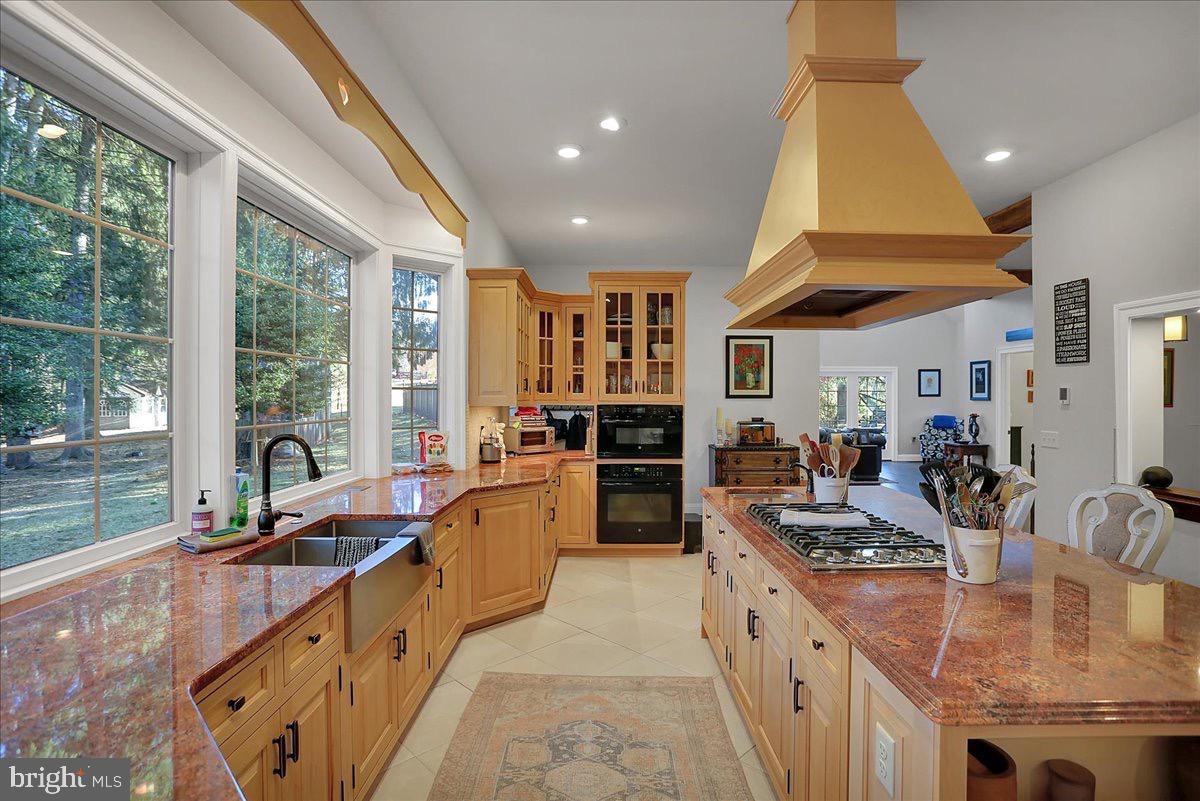 338 Candy Road Mohnton, PA 19540 - Photo 21 of 63 a large kitchen with kitchen island a large window a sink and stainless steel appliances
