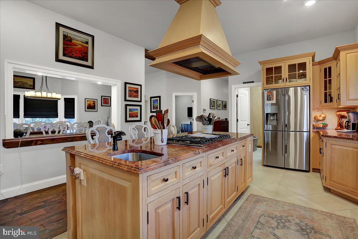 338 Candy Road Mohnton, PA 19540 - Photo 23 of 63 a kitchen with stainless steel appliances granite countertop a sink stove and refrigerator