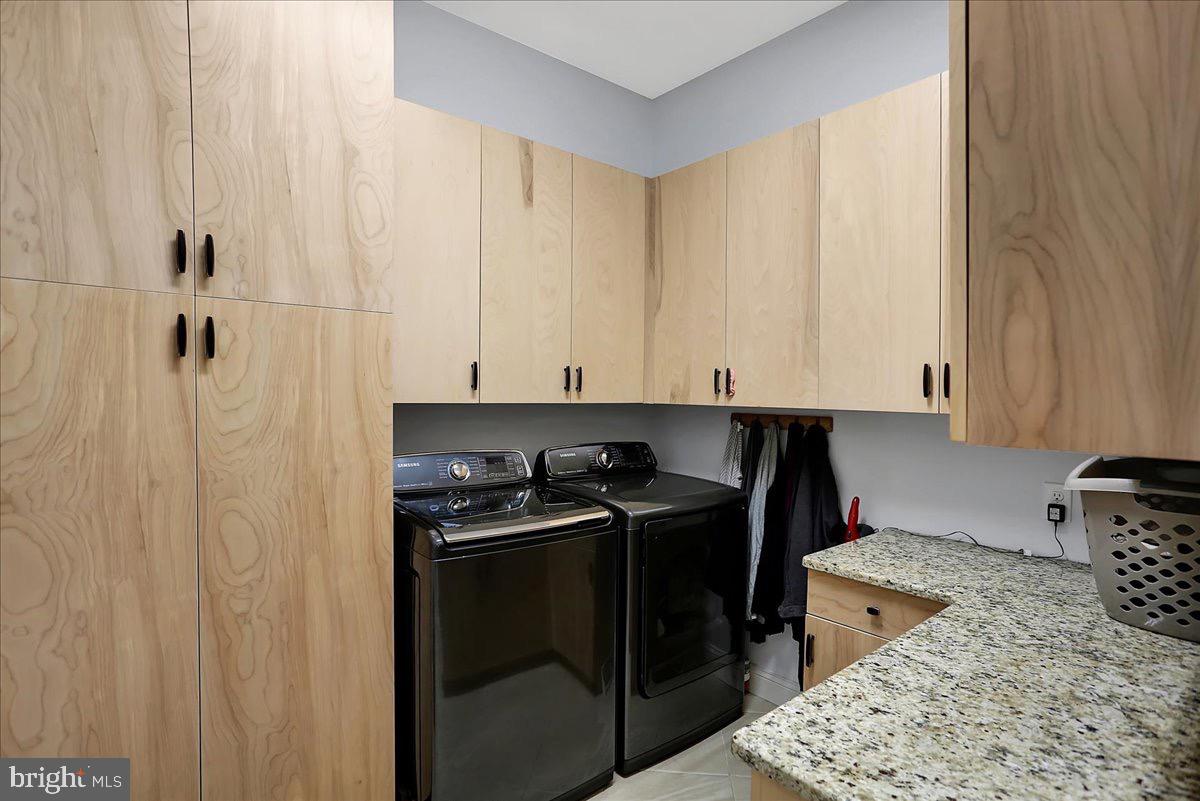 338 Candy Road Mohnton, PA 19540 - Photo 25 of 63 a kitchen with stainless steel appliances granite countertop a stove a sink and a refrigerator
