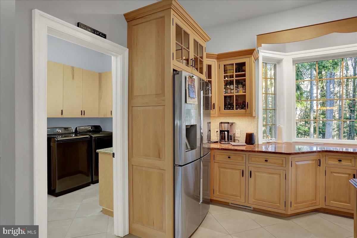 338 Candy Road Mohnton, PA 19540 - Photo 26 of 63 a kitchen with a refrigerator and cabinets