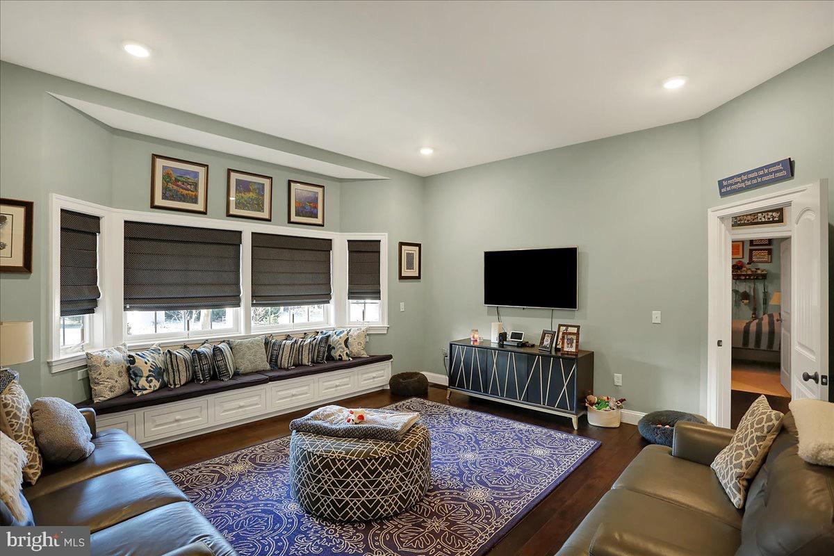 338 Candy Road Mohnton, PA 19540 - Photo 27 of 63 a living room with furniture and a flat screen tv