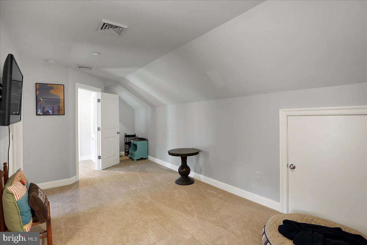 338 Candy Road Mohnton, PA 19540 - Photo 43 of 63 a view of a livingroom with a flesh screen tv and windows