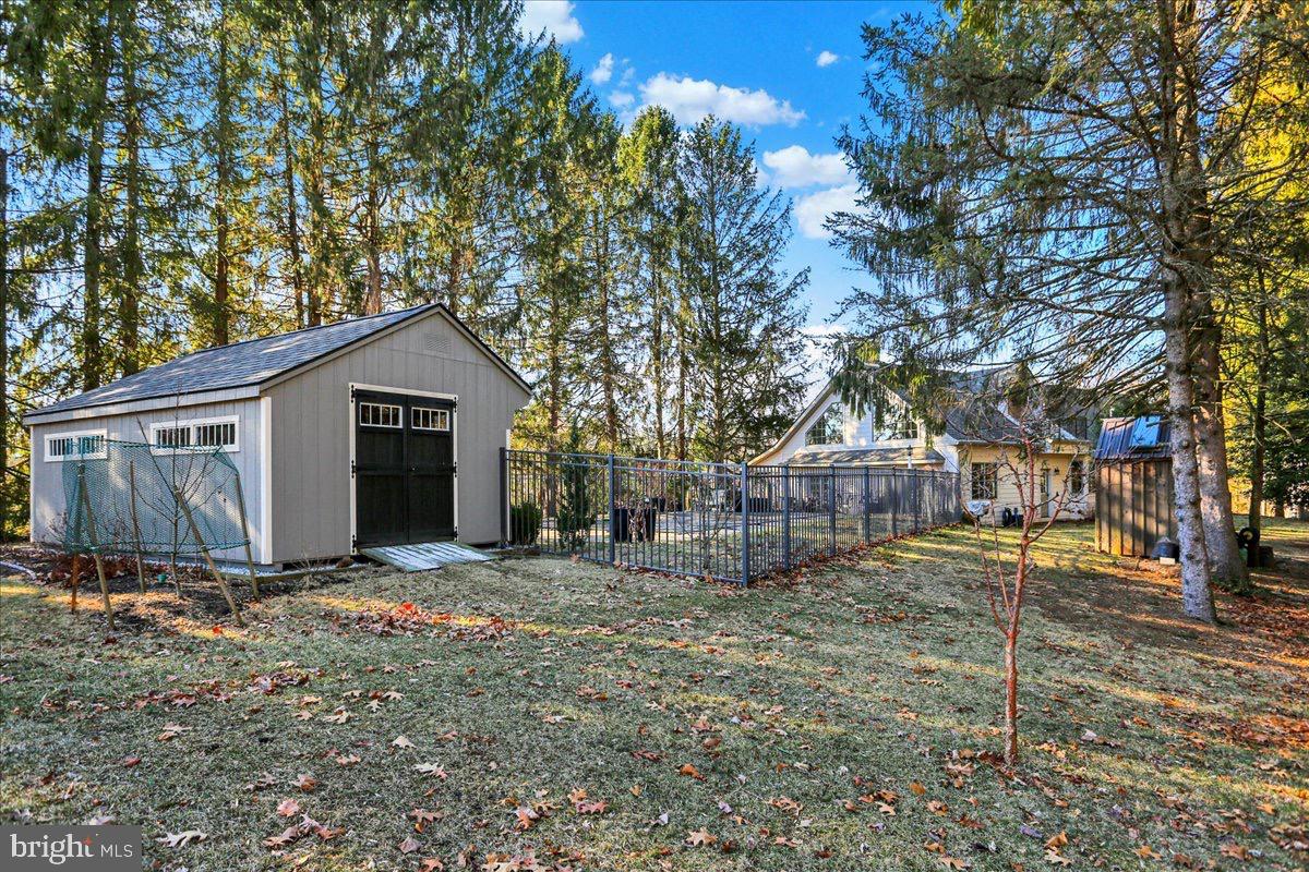 338 Candy Road Mohnton, PA 19540 - Photo 53 of 63 a view of a house with a yard and tree