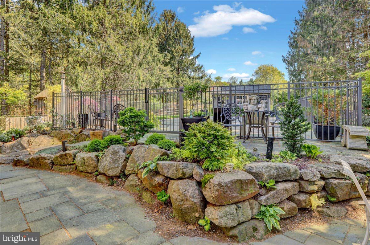 338 Candy Road Mohnton, PA 19540 - Photo 59 of 63 a view of a chairs and table in a backyard