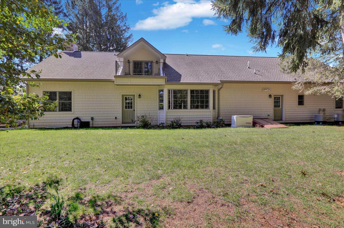 338 Candy Road Mohnton, PA 19540 - Photo 63 of 63 a front view of house with yard and trees in the background