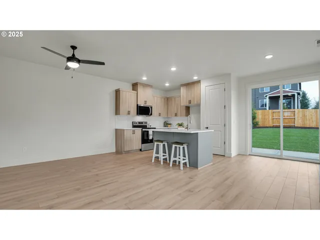 a black and white photo of a living room