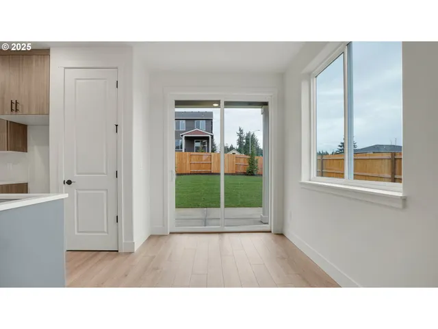 a kitchen with stainless steel appliances a stove microwave and cabinets