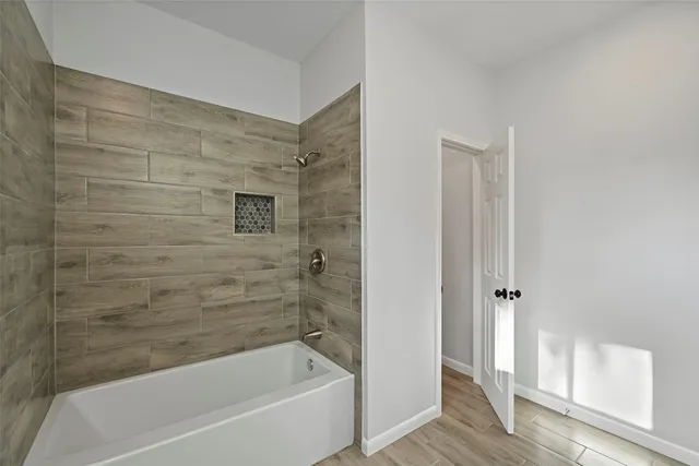 a bathroom with 2 sink and a mirror