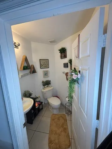 a view of a toilet in a bathroom