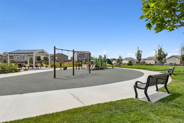 a view of a house with a park