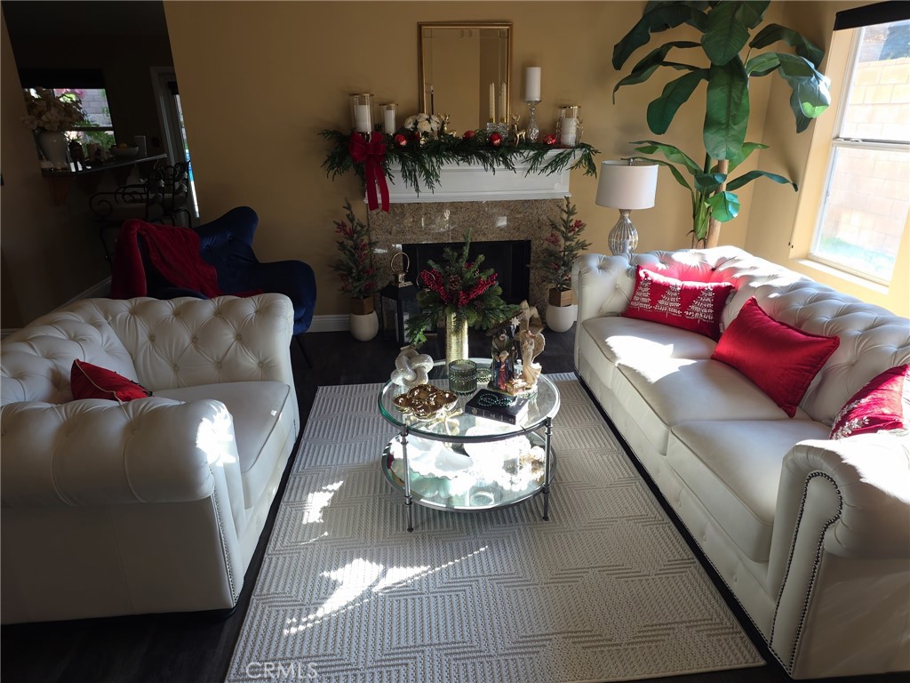 1806 Madison Street Redlands, CA 92374 - Photo 17 of 31 a living room with furniture and a fireplace