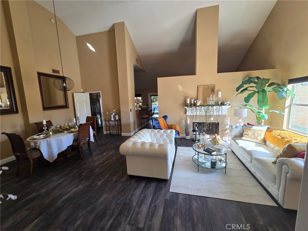 1806 Madison Street Redlands, CA 92374 - Photo 20 of 31 a living room with furniture fireplace and a flat screen tv