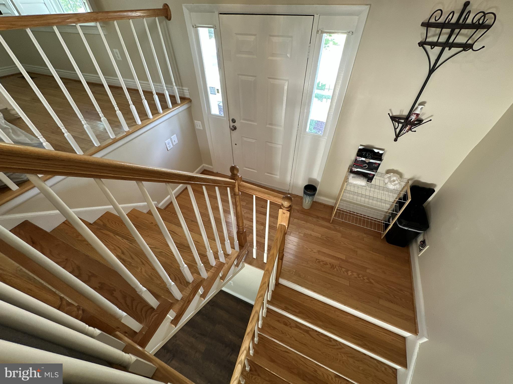 8705 Loughran Road Fort Washington, MD 20744 - Photo 5 of 25 Open staircase with hardwood floors
