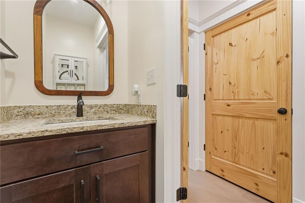 4844 Lucerne Road Indiana, PA 15701 - Photo 33 of 39 a bathroom with a granite countertop sink and a mirror