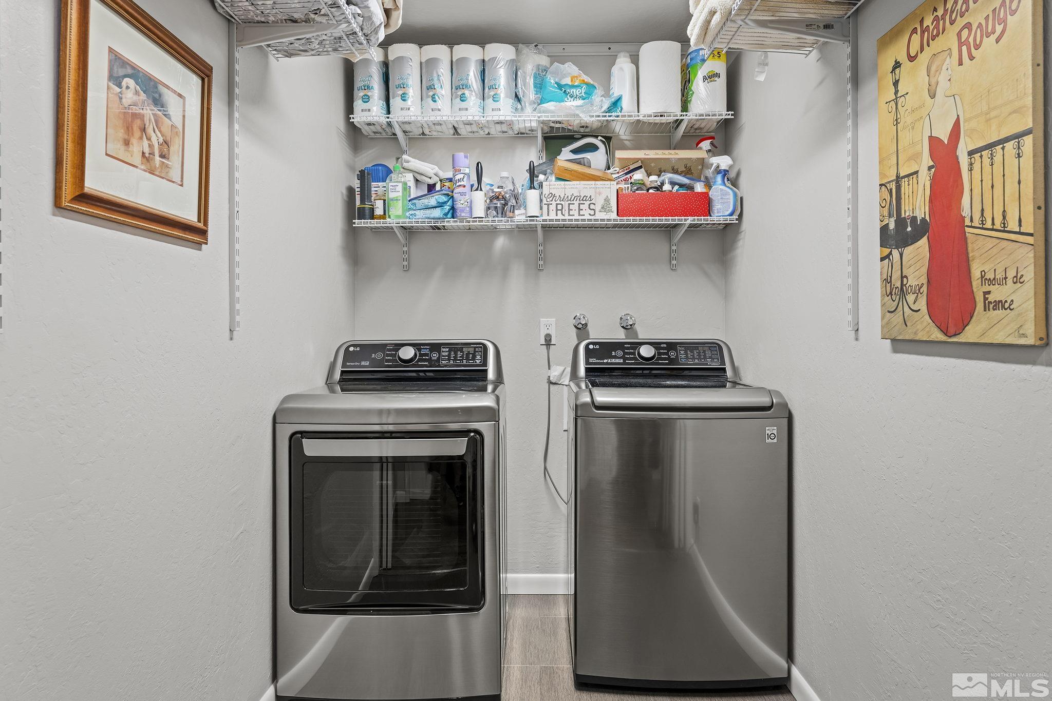 1953 South Villa Way Reno, NV 89509 - Photo 14 of 31 a kitchen with stainless steel appliances granite countertop a refrigerator and a stove