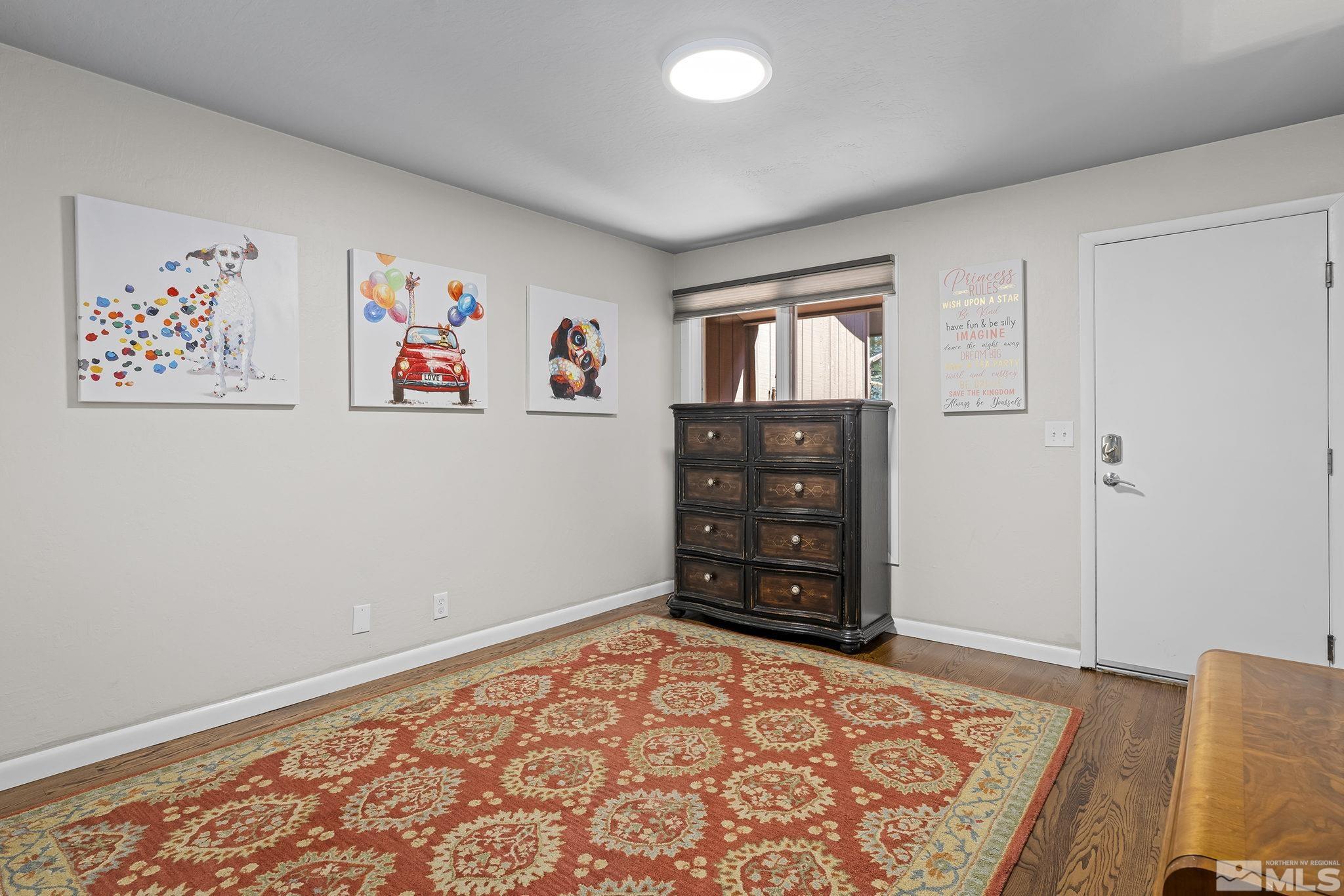 1953 South Villa Way Reno, NV 89509 - Photo 23 of 31 an empty room with window and furniture
