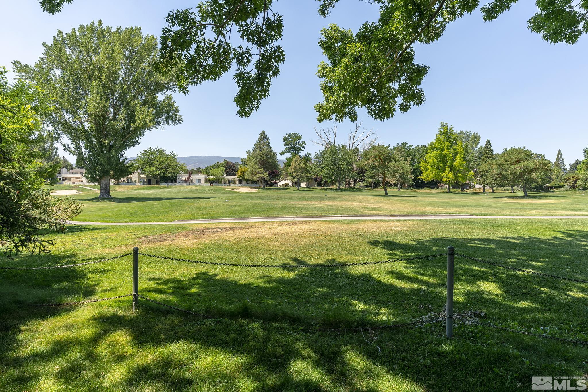 1953 South Villa Way Reno, NV 89509 - Photo 27 of 31 a view of a golf course with a lake
