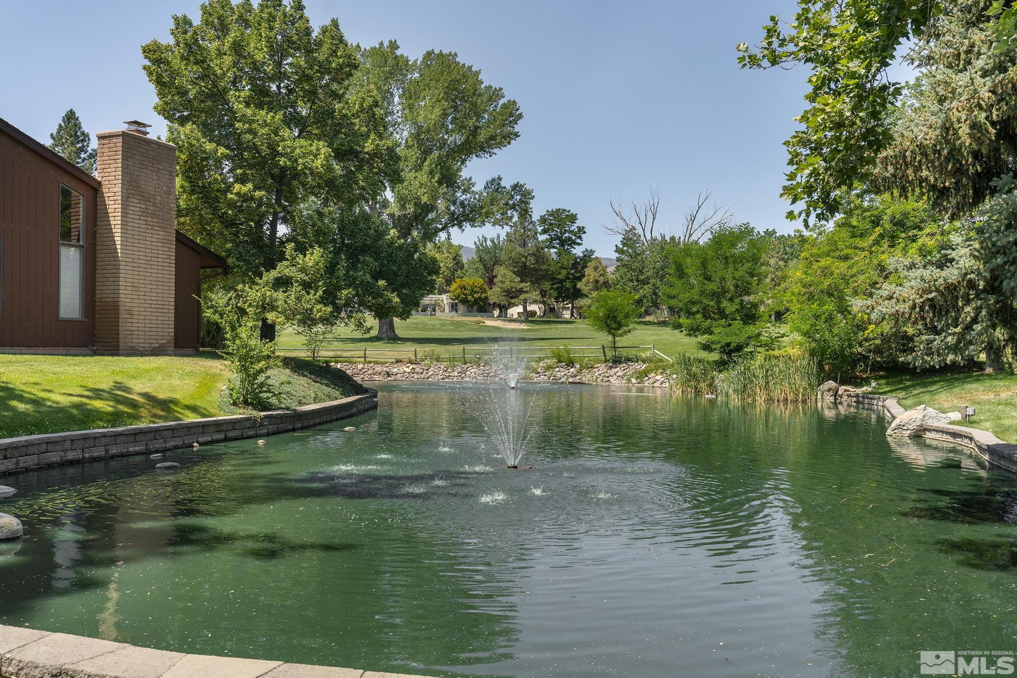 1953 South Villa Way Reno, NV 89509 - Photo 28 of 31 a view of lake with green space